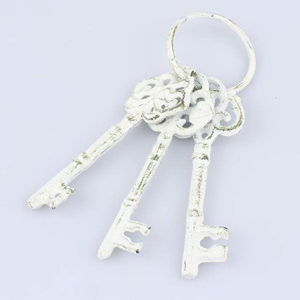 Bílé dekorativní litinové klíče Dakls